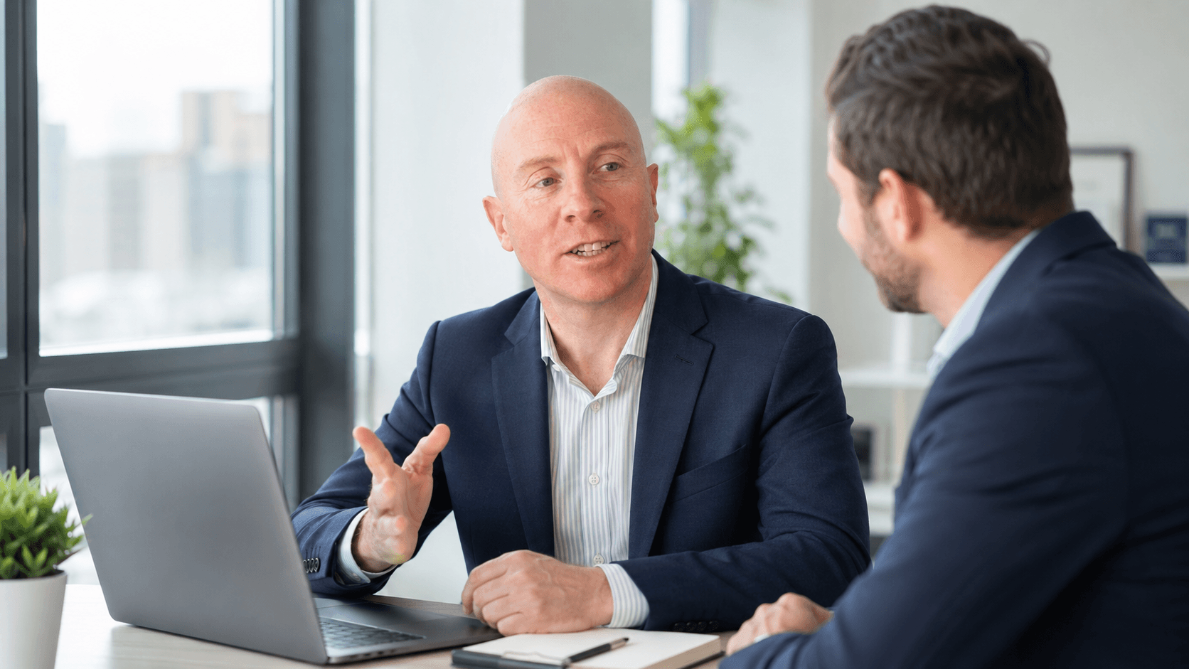 Robert Furman discussing business processes and AI solutions with a business owner
